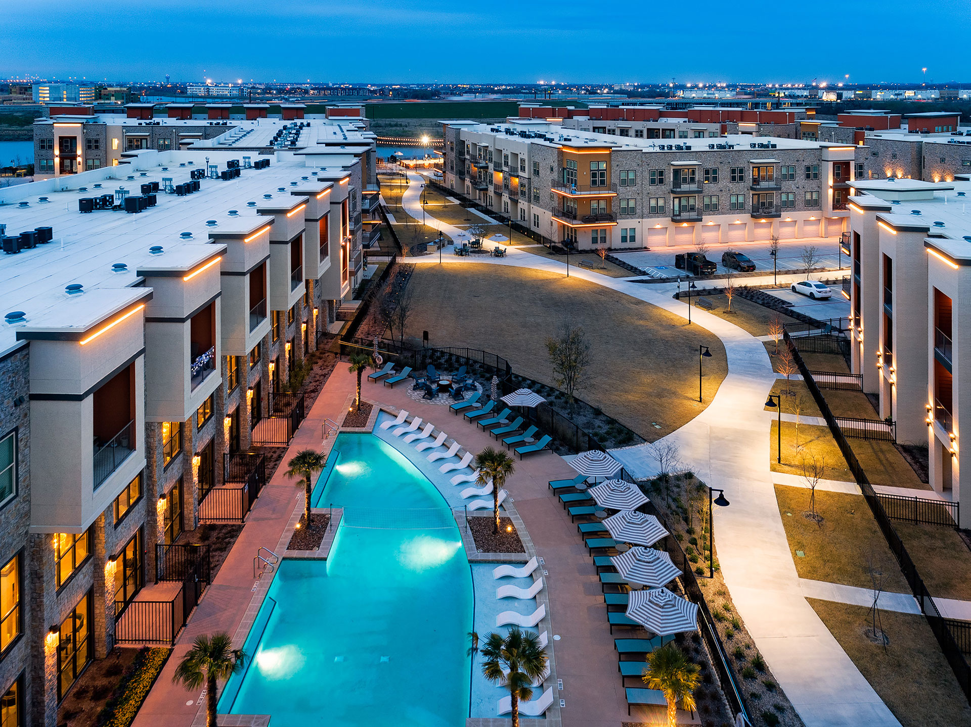 birds eye view of pool and buildings