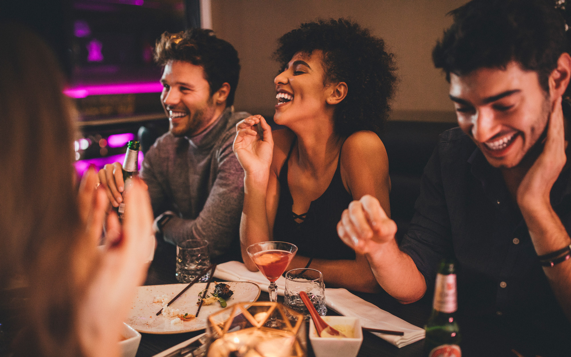 diverse friends dining in a restaurant